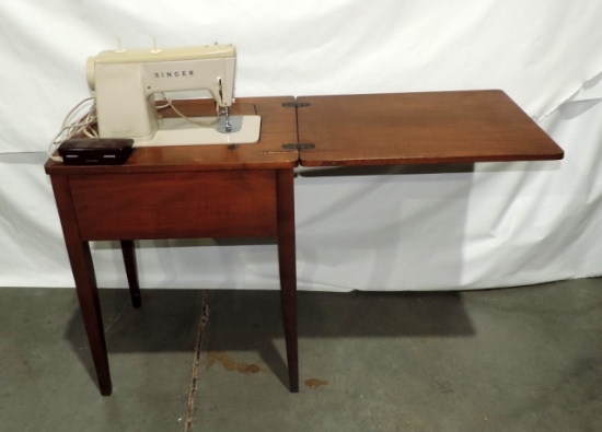 Singer Sewing Machine In Wood Cabinet