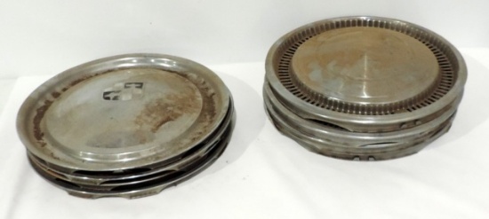 2 Lots of 4 matching Hubcaps