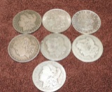 (7) Morgan Silver Dollars