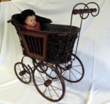 Brown Wicker Baby Buggy With Old Doll