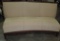 Curved Wood Frame Sofa With Gold/Tan Fabric