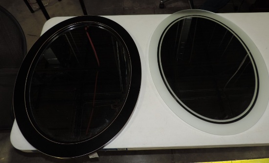 2 Oval Mirrors