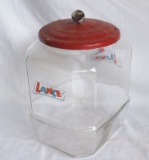 Antique Lance Cracker Jar with Metal Red Lid