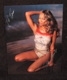 Autographed 6.75x8.75 Photo of Tyra Banks