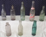 Lot of (8) Early Soda Bottles