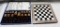 FINE WOOD CARVED CHESS SET WITH INLAID GAMEBOARD BOX