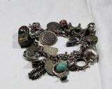 STERLING SILVER CHARM BRACELET