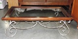 ORNATE IRON BASED WOOD FRAMED GLASS TOP COFFEE TABLE