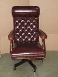 BURGUNDY LEATHER COVERED EXECUTIVE DESK ARM CHAIR