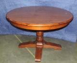 PINE ROUND PEDESTAL BASE DINING TABLE WITH 2 LEAVES