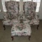 Pair of floral wing back chairs with a complementary stool