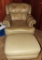 Beige leather chair with ottoman by Classic Leather