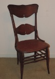 Antique oak chair with linoleum seat