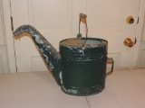 Antique long-necked watering cans