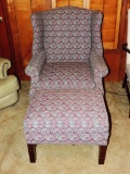 Upholstered wing chair with ottoman