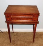 Antique two-drawer spool cabinet on legs