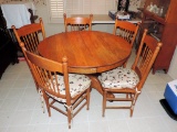 Antique round oak table and six chairs