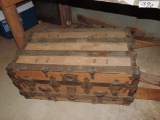 Antique flat top trunk with a tray