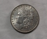 1883 O AU Morgan Silver Dollar