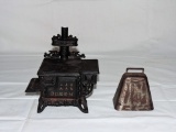 Vintage Queen Cook stove and Antique Cow Bell