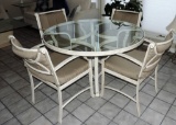 Round top painted aluminum table with four chairs