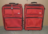 Pair Of Red Canvas Ricardo Roll Around Suitcases