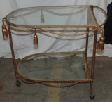 Gold Painted Metal & Glass Roll Around Table