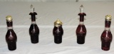 Five Pieces of Red Cut To Clear Oil Bottles With Metal Lids Or Stoppers