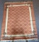 Machine-Made Rust-Colored Scatter Rug