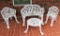 Four-Piece White Cast Iron Porch Set