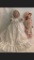 Pair Of Vintage Composition Dolls With Clothing