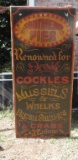 Hand-Painted Trade Sign on Wood