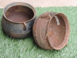 Two Smaller Cast Iron Pots