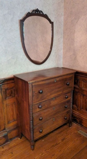 Country Sheraton Rowan County Walnut 4 Drawer Chest with a Shield Shaped Mirror.