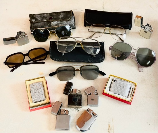Lot of Eye Glasses and Cigarette Lighters