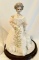 Porcelain Doll in Globe