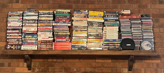 Mountain of VCRs, CDs and DVDs