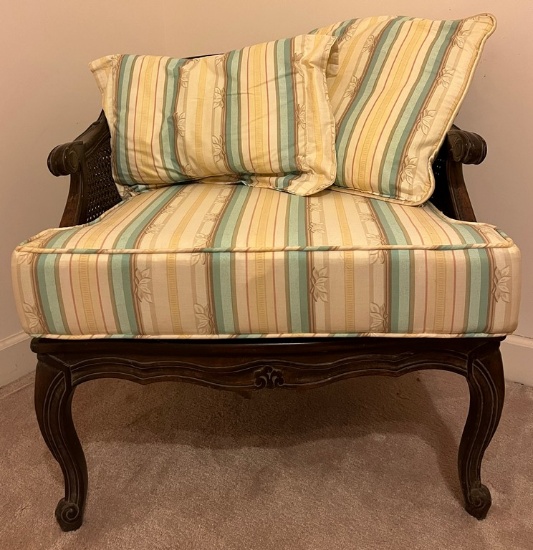 Rounded Arm Chair with Cane Back and Upholstered Seat and Pillow