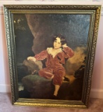 Canvas Print Of Young Boy Seated In Burgundy Clothing