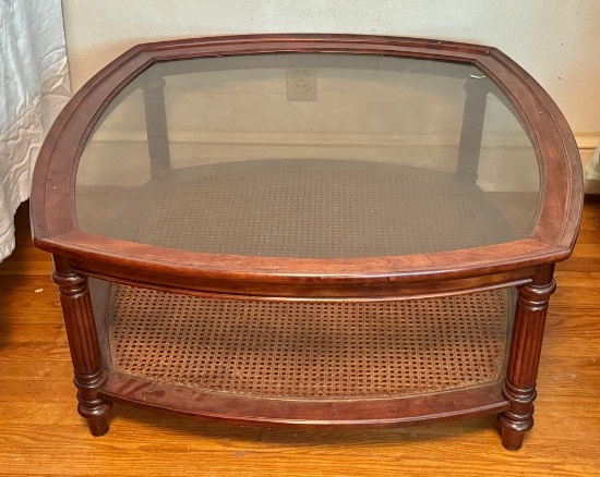 Glass Top Coffee Table with a Woven Bottom Shelf