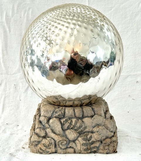 Resin Base Holding a Silver Gazing Ball