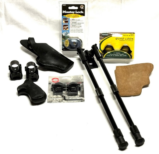 Lot of gun parts,holsters, and more