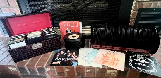 One Storage Cases of Eight Tracks and Box of 45s