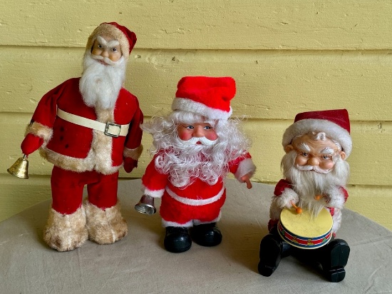 Three Mechanical Santa Clauses