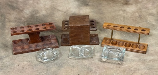 Three Wooden Pipe Holders and Three Glass Ashtrays