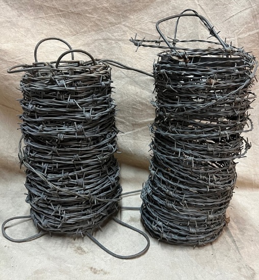 Two Partial Rolls of Barbed Wire