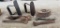 Three Cast Iron Irons and Four Woodstove Handles and One Railroad Spike