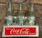 Six Pack of Coke Bottles in a Vintage Metal Coca-Cola Carrier