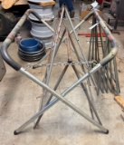 Five Metal Folding Saw Horses and One Large Saw Horse