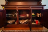 Contents of Entry Buffet Cabinet. Glass Stemware, Plate settings, Porcelain Collectibles and Misc